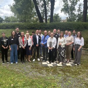 Gruppenfoto mit mehreren Mitarbeiter*innen der Häuser zum Leben und der Geriatrischen Gesundheitszentren der Stadt Graz.